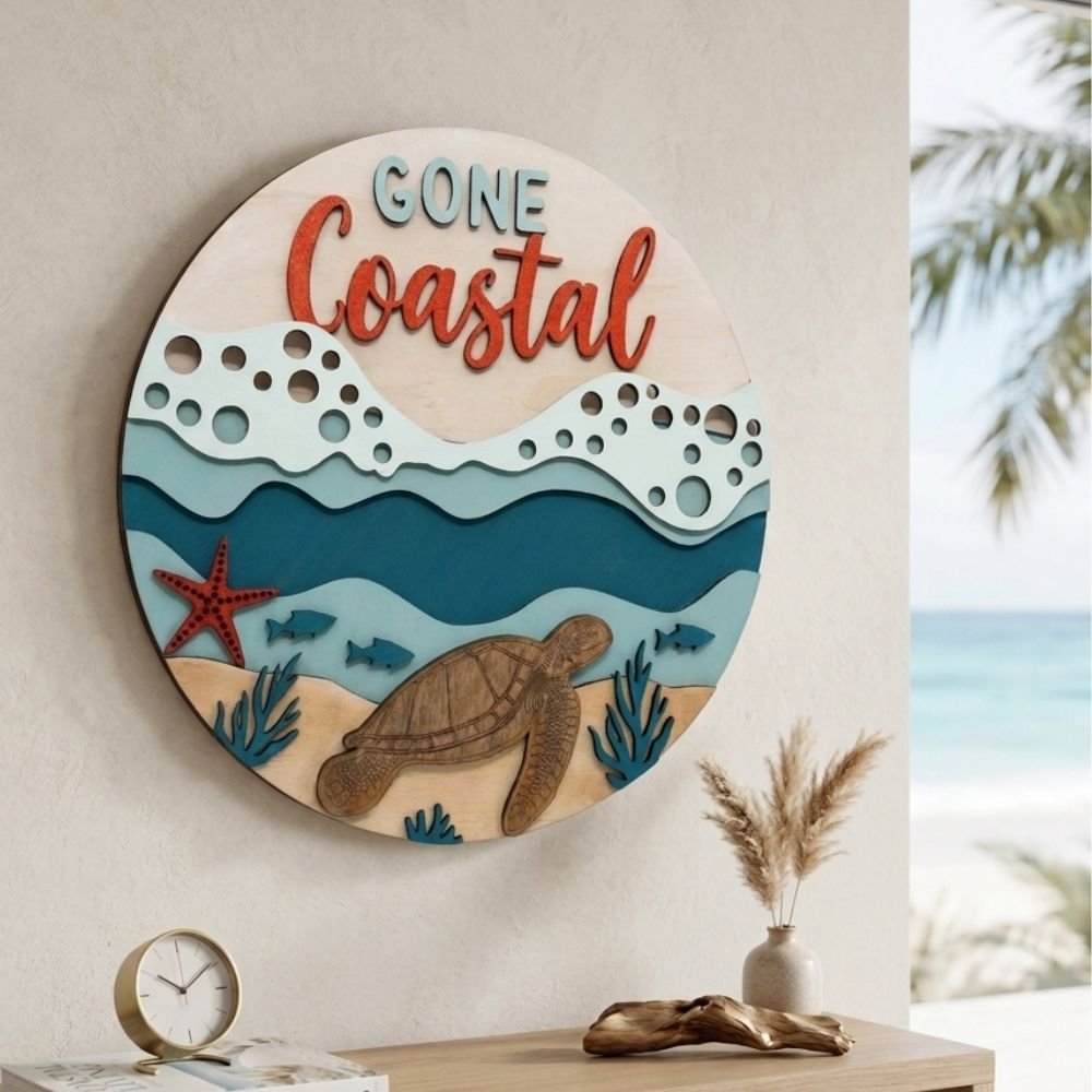 Circular layered wood art featuring turtle, starfish and fish in blue ocean waves