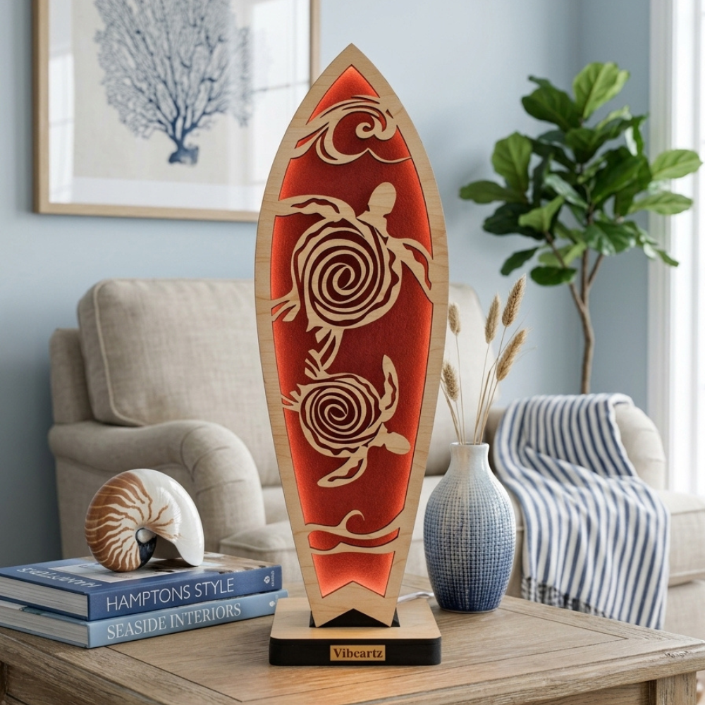 Sea turtle LED lamp glowing with warm orange light through an intricate laser-cut turtle and wave design