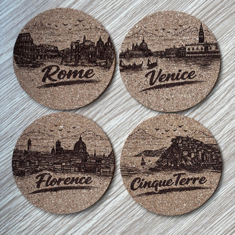 Set of four 100mm natural cork coasters featuring laser engraved designs of Rome, Venice, Florence and Cinque Terre