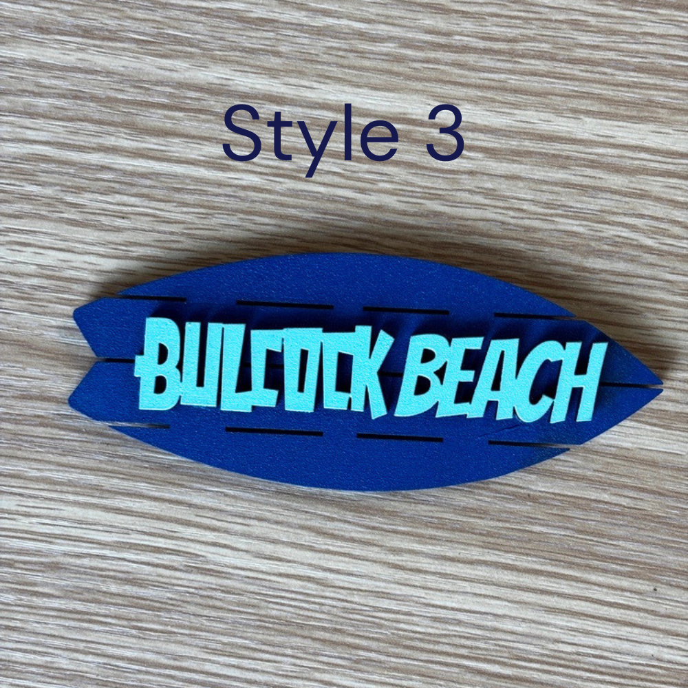 Coastal-style wooden fridge magnet with beach